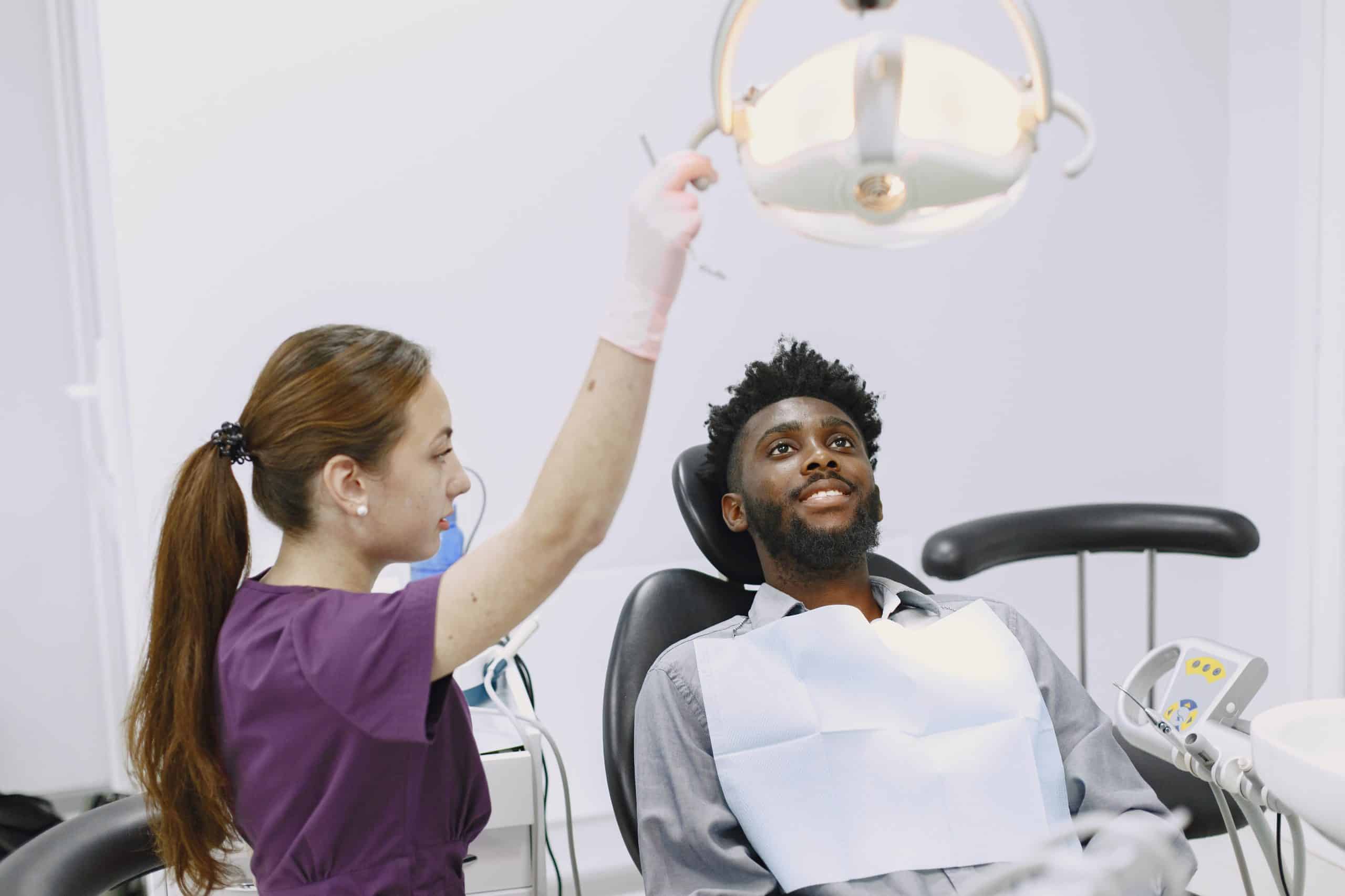 Patient getting dental exam in Brandon, FL
